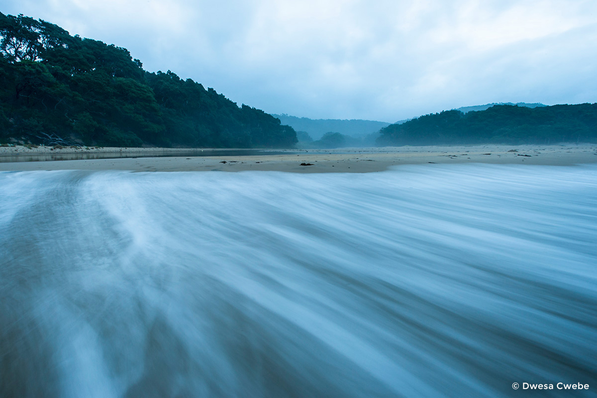 Waves breaking at dawn on the coastline of the Dwesa-Cwebe Marin